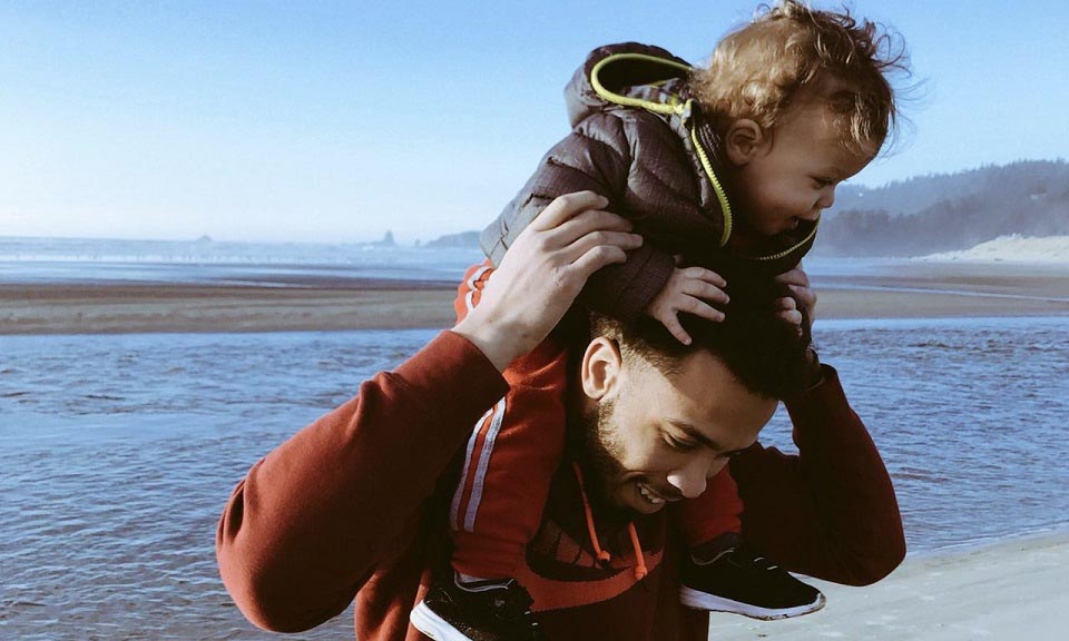 Father and child Man carrying baby